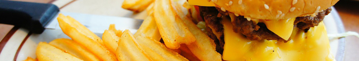 Eating Burger at Ron's Hamburgers & Chili restaurant in Jenks, OK.